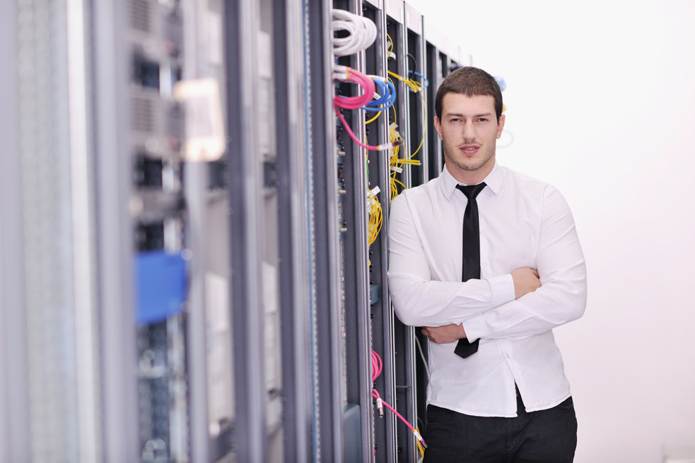 young it engeneer in datacenter server room